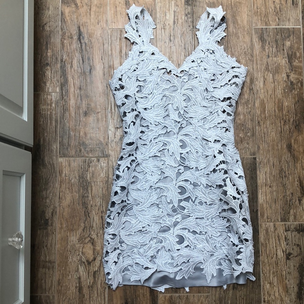 Never worn, tight silver formal dress